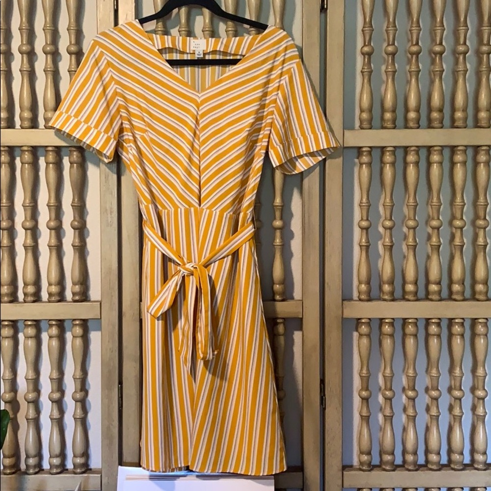 Yellow striped dress with tie.